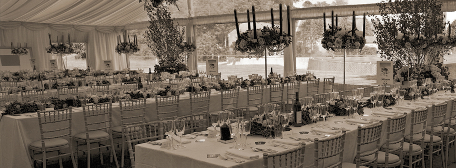 Chairs laid out in wedding marquee